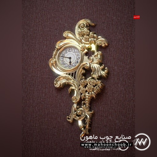 ساعت دیواری مدل تارادیس ساعت چوبی منبت شده سلطنتی ماهون چوب