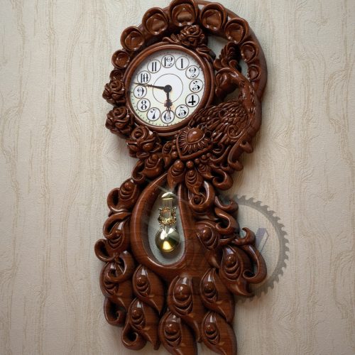 ساعت دیواری طاووس چوبی منبت شده سلطنتی ماهون چوب